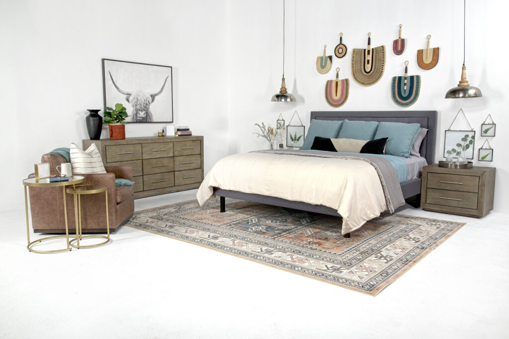 Masculine living area styling with cowhide rug and musical accessories with ASR Design Studio
