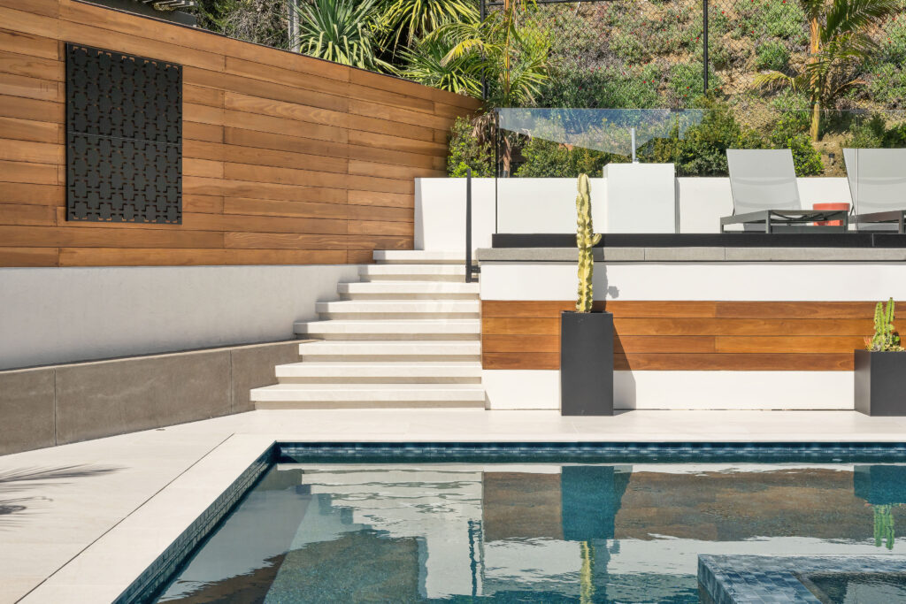 Upscale residential design outdoor yard with sophisticated landscaping and luxury home interior design connection