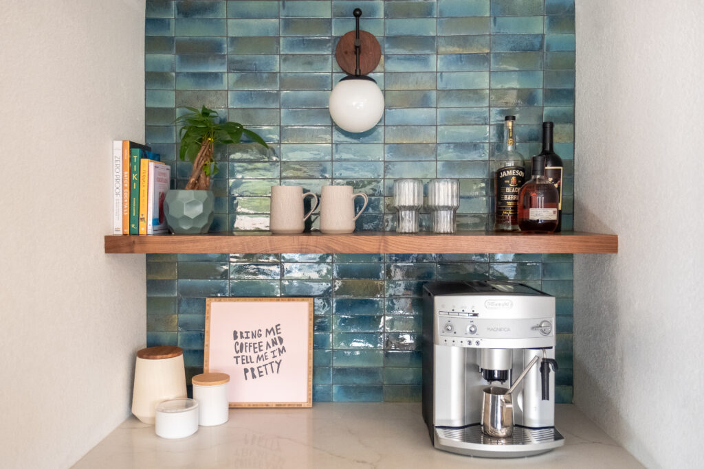 High-end kitchen countertop in San Diego with a sleek espresso machine, perfect for specialty coffee lovers in luxury homes.