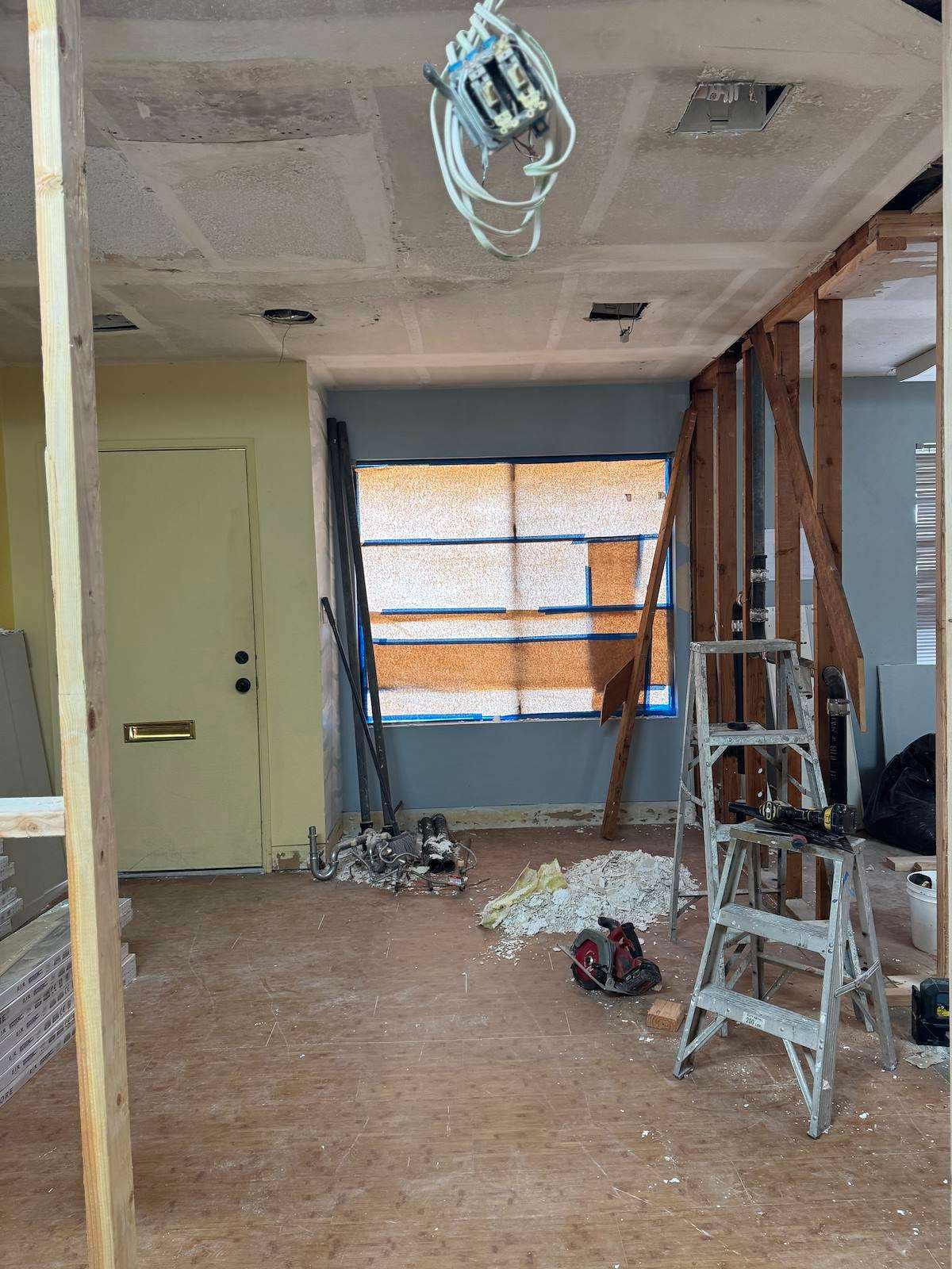 Smiles by Pai before: entry and front window during demolition, before the new reception was built
